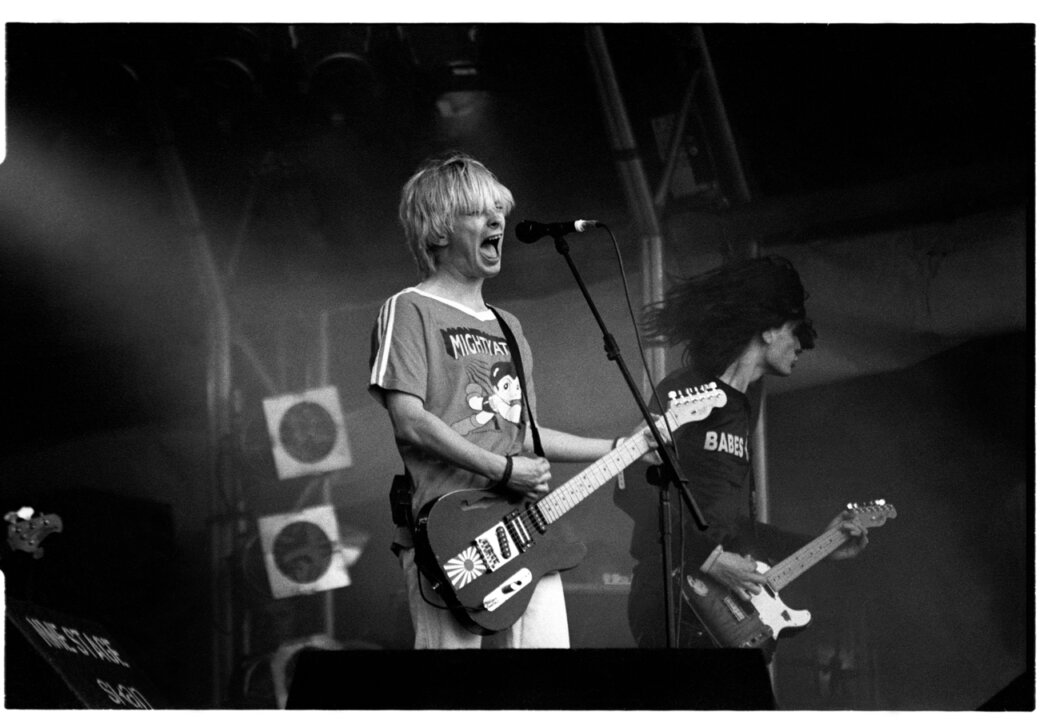 A young Thom Yorke of Radiohead during the band's first Glastonbury Festival appearance on the NME Stage, June 26 1994, Pilton Farm, England. The band debuted songs from their forthcoming classic Bends album during this set.