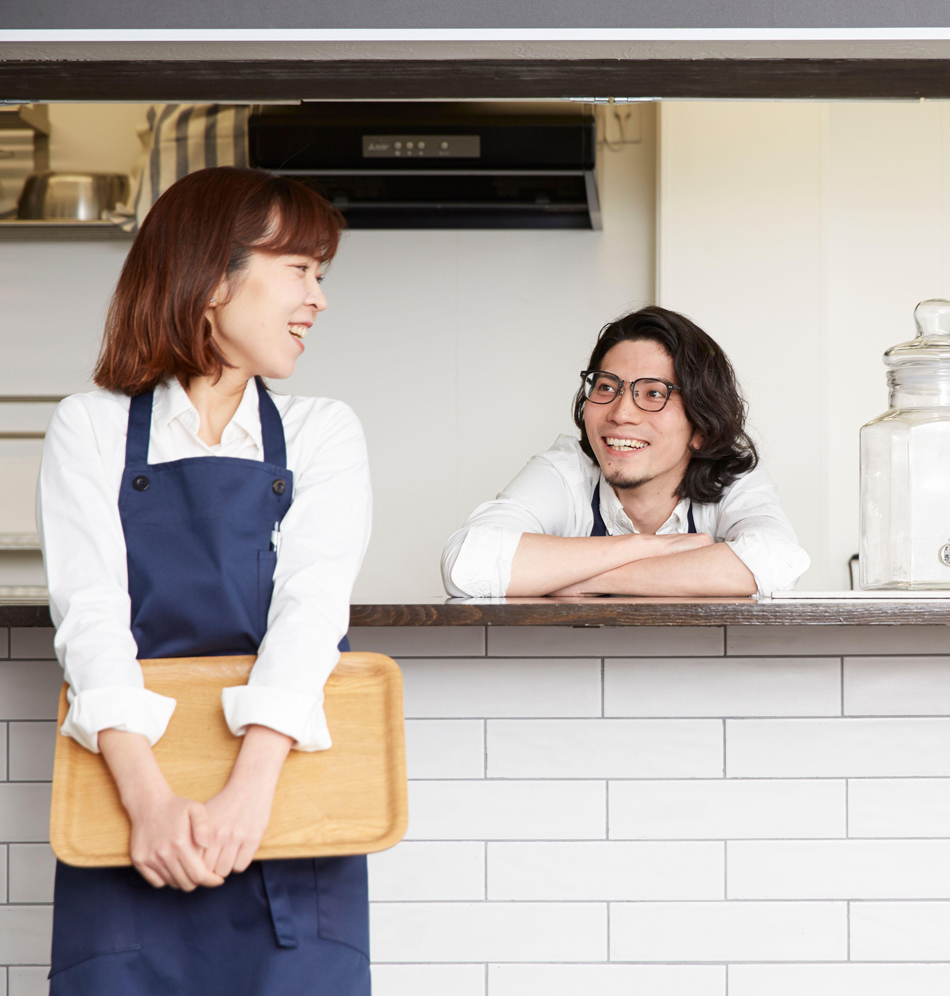 A man and a woman talking to each other
